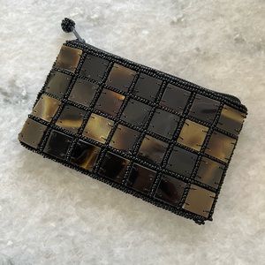 World of Good coin purse. 3” high, 5” wide. Cute tile design and beading